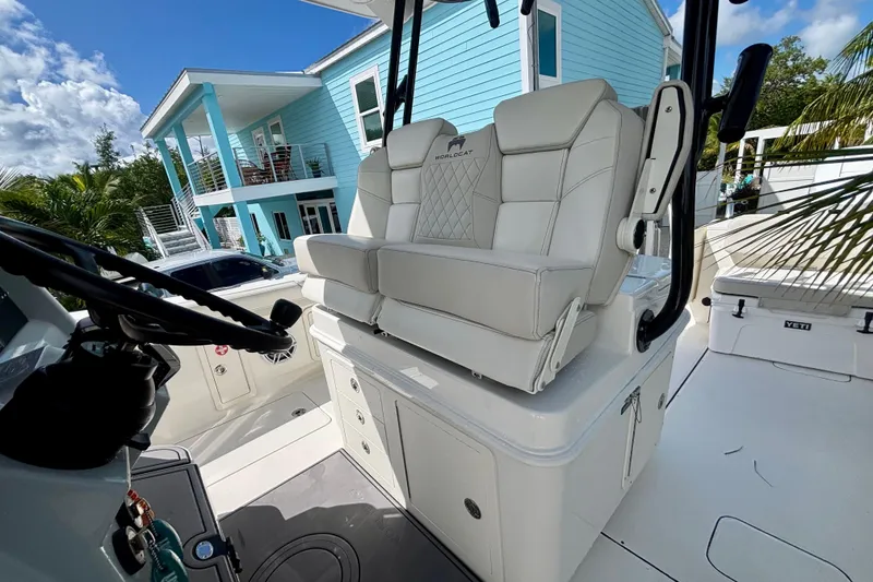 Slide: The Image of 2024 World Cat 325 CC boat interior with luxurious seating and modern design. - 47