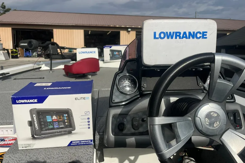 Slide: The Image of 2020 G3 BOATS Sportsman 1810 dashboard with Lowrance Elite fishfinder and steering wheel. - 18