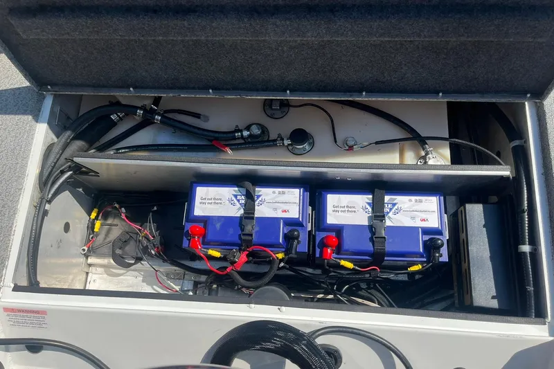 Slide: The Image of 2020 G3 BOATS Sportsman 1810 battery compartment with dual batteries and wiring. - 22