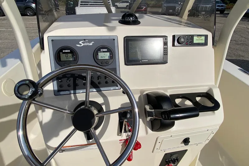 Slide: The Image of Control panel of a 2018 Scout 195 Sportfish boat with Yamaha gauges. - 14