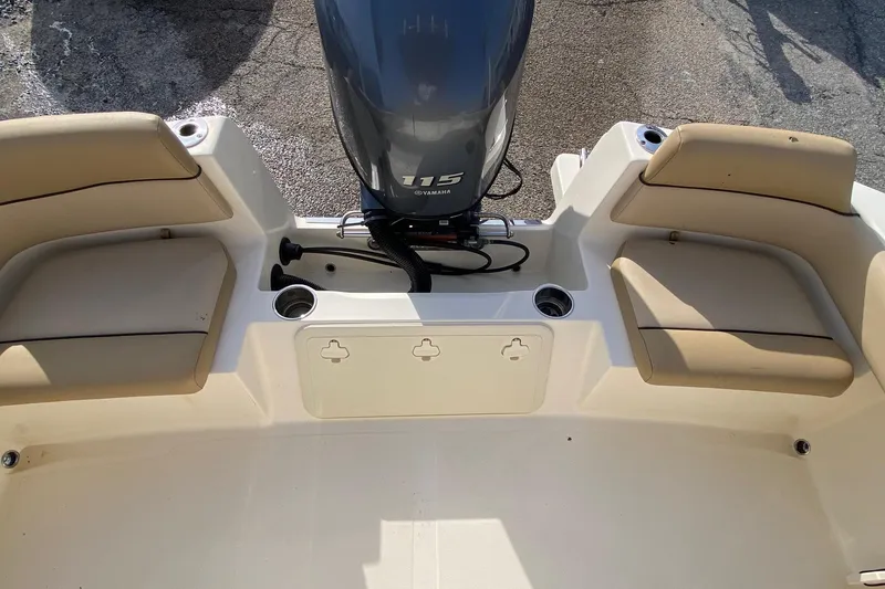 Slide: The Image of 2018 Scout 195 Sportfish boat plumbing and filtration system components. - 17
