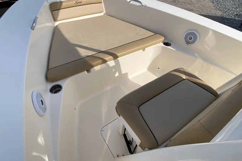 Slide: The Image of 2018 Scout 195 Sportfish boat dashboard with steering wheel and control panel. - 8