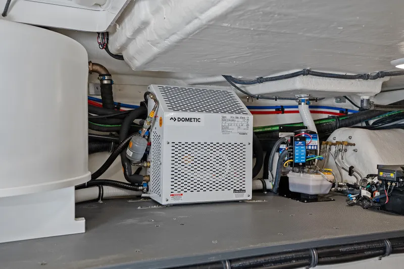 Slide: The Image of 2024 Formula 500 Super Sport Crossover boat with triple Mercury engines on open water. - 11