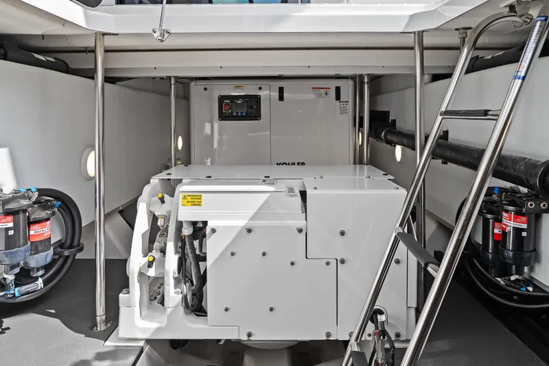 Slide: The Image of 2024 Formula 500 Super Sport Crossover engine room with Dometic equipment and wiring. - 12