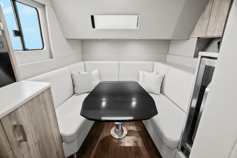 Slide: The Image of 2024 Formula 500 Super Sport Crossover engine room with modern equipment and ladder access. - 13