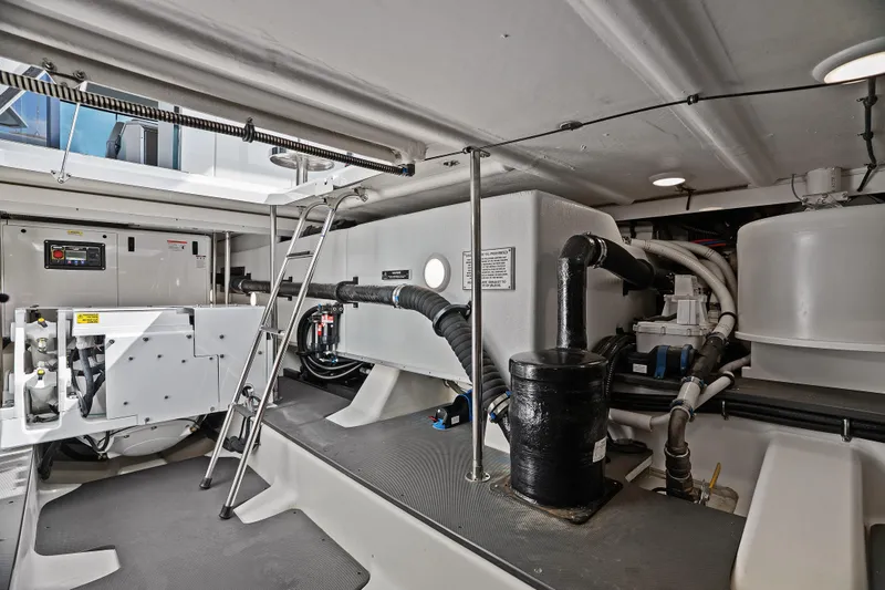 Slide: The Image of 2024 Formula 500 Super Sport Crossover engine room with batteries and wiring. - 33