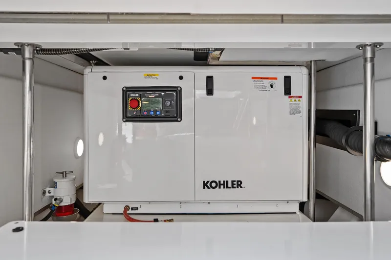 Slide: The Image of Engine room of 2024 Formula 500 Super Sport Crossover, showcasing mechanical components and ladder. - 34