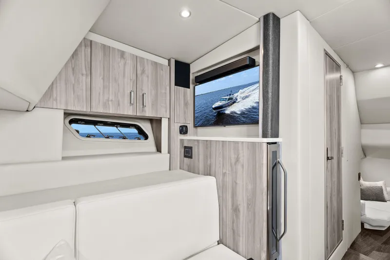 Slide: The Image of 2024 Formula 500 Super Sport Crossover interior with modern wood finish and cozy seating. - 36