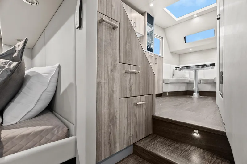 Slide: The Image of Luxurious 2024 Formula 500 Super Sport Crossover cabin with bed and TV. - 40