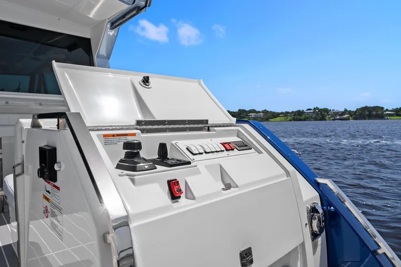 Slide: The Image of 2024 Formula 500 Super Sport Crossover interior with modern wood cabinetry and skylights. - 41