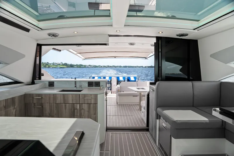 Slide: The Image of 2024 Formula 500 Super Sport Crossover boat interior with luxurious seating and modern design. - 48