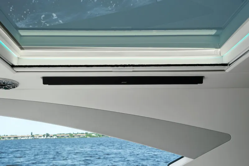 Slide: The Image of Luxurious interior of 2024 Formula 500 Super Sport Crossover yacht with modern kitchen and seating. - 49