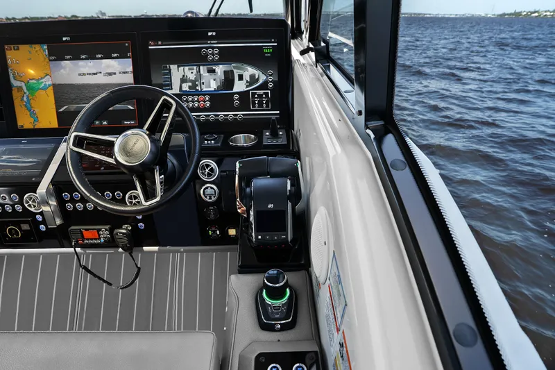 Slide: The Image of 2024 Formula 500 Super Sport Crossover dashboard with advanced navigation and control systems. - 54