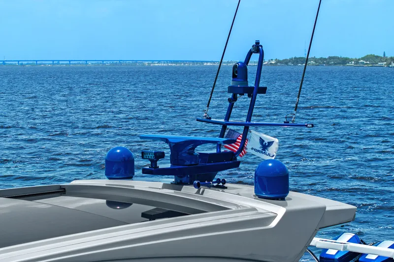 Slide: The Image of 2024 Formula 500 Super Sport Crossover with four Mercury outboard engines on water. - 6