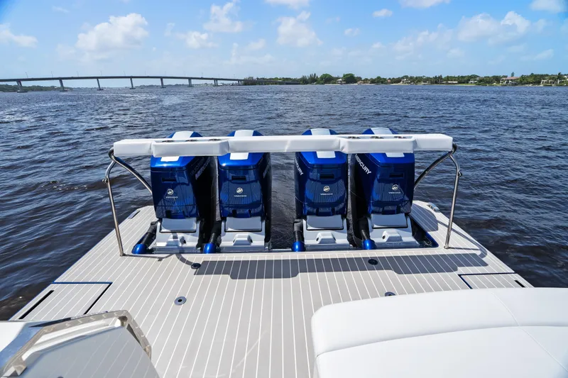 Slide: The Image of 2024 Formula 500 Super Sport Crossover boat control panel on deck by the water. - 63