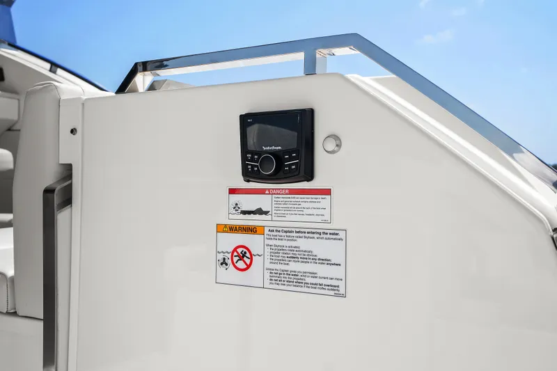 Slide: The Image of 2024 Formula 500 Super Sport Crossover with quad Mercury outboard engines on open water. - 64