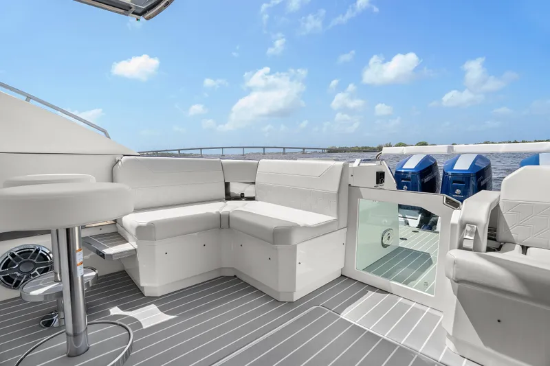 Slide: The Image of 2024 Formula 500 Super Sport Crossover luxury yacht with spacious seating on open water. - 68