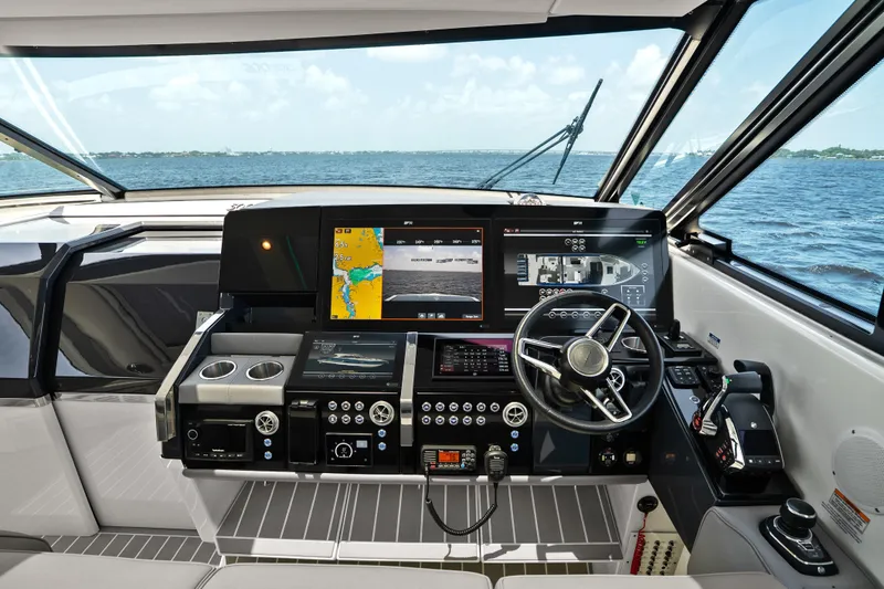 Slide: The Image of Luxurious interior of 2024 Formula 500 Super Sport Crossover yacht with sleek seating and ocean view. - 78