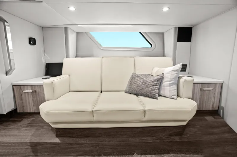 Slide: The Image of 2024 Formula 500 Super Sport Crossover boat docked with four powerful outboard engines. - 83