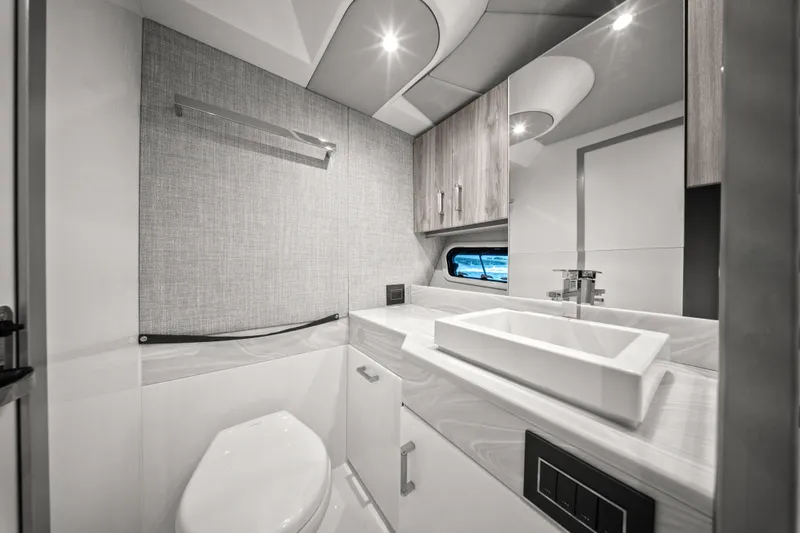 Slide: The Image of 2024 Formula 500 Super Sport Crossover interior, featuring sleek, modern bathroom design. - 85