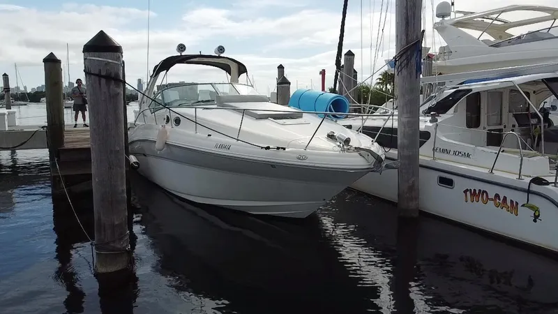 The Image of 2005 Sea Ray 320 Sundancer docked at marina. - 0