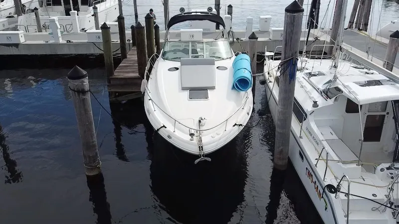 Slide: The Image of 2005 Sea Ray 320 Sundancer docked at marina, aerial view. - 3
