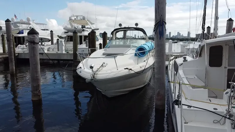 Slide: The Image of 2005 Sea Ray 320 Sundancer docked at marina. - 4