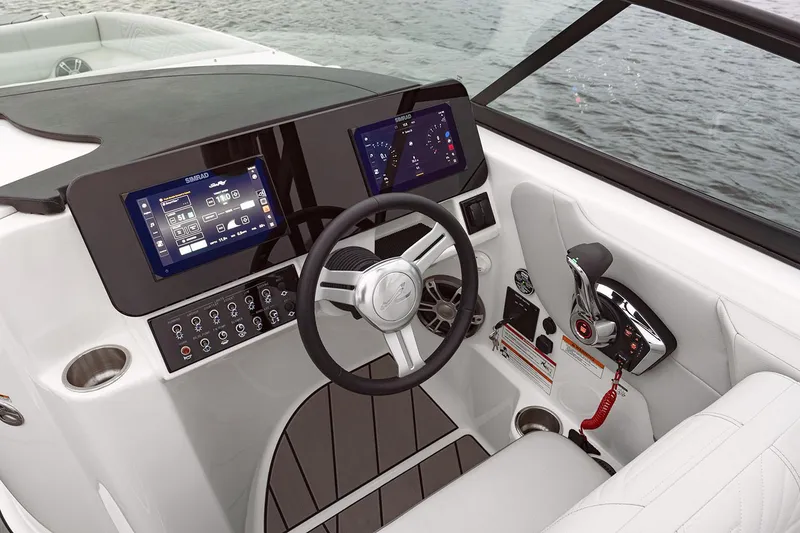 Slide: The Image of 2025 Sea Ray SDX 270 Surf boat interior with luxurious seating and cup holders. - 6