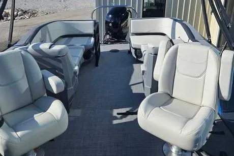 Slide: The Image of 2025 Starcraft GX 22 R DH Sport boat interior with plush seating and modern design. - 5