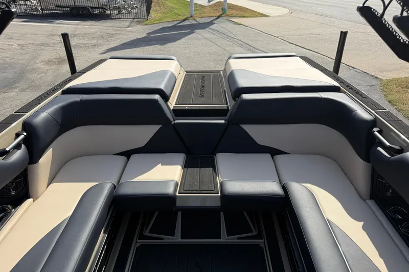 Slide: The Image of 2026 Moomba Mojo boat interior with spacious seating and sleek design. - 11