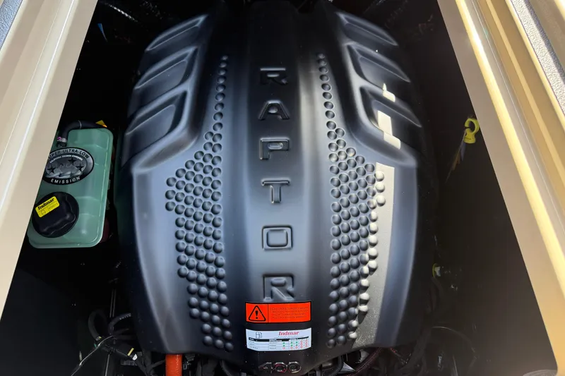 Slide: The Image of 2026 Moomba Mojo engine with Raptor branding, showcasing powerful performance features. - 14