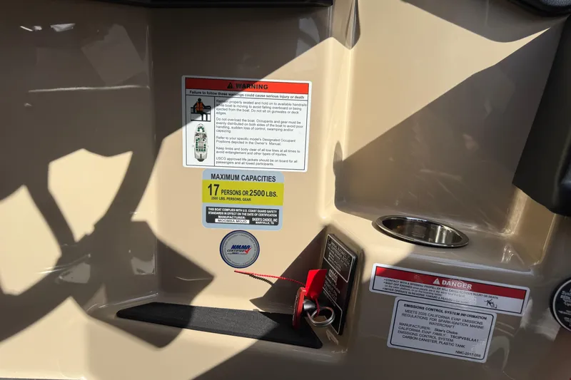 Slide: The Image of 2026 Moomba Mojo boat capacity and safety warning labels, maximum 17 persons or 2500 lbs. - 29