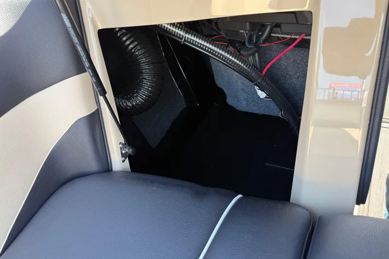 Slide: The Image of 2026 Moomba Mojo interior compartment with wiring and ventilation. - 32