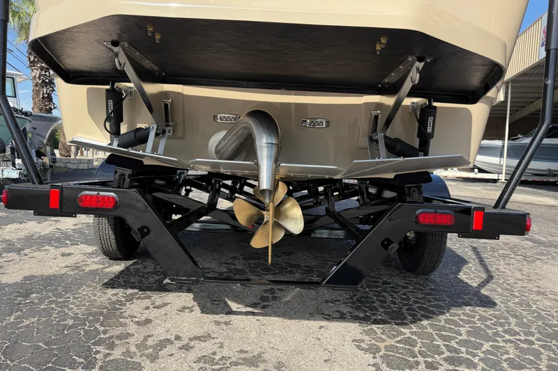 Slide: The Image of 2026 Moomba Mojo boat trailer with visible propeller and rear view. - 40