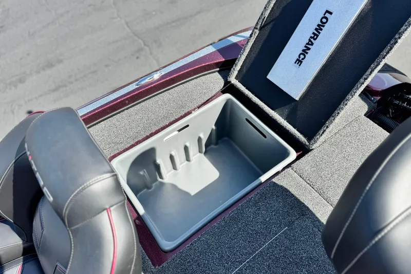 Slide: The Image of 2023 Nitro Z18 boat storage compartment with Lowrance electronics, featuring spacious interior and sleek design. - 15