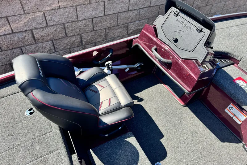 Slide: The Image of 2023 Nitro Z18 boat interior with seat and storage compartment. - 16