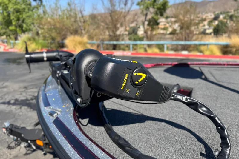 Slide: The Image of 2023 Nitro Z18 boat with Maxxum trolling motor on deck, outdoors. - 8