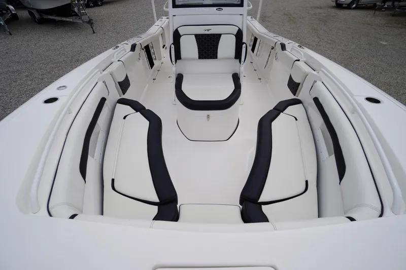 Slide: The Image of 2021 Tidewater 256 CC Adventure boat interior with spacious seating and modern design. - 10