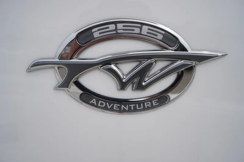 Slide: The Image of 2021 Tidewater 256 CC Adventure logo emblem on white background. - 3