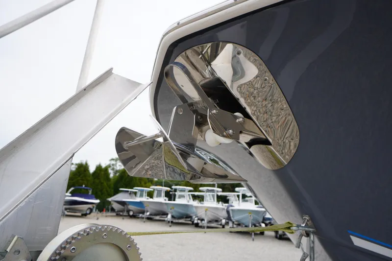 Slide: The Image of 2021 Tidewater 256 CC Adventure boat anchor detail with other boats in background. - 4