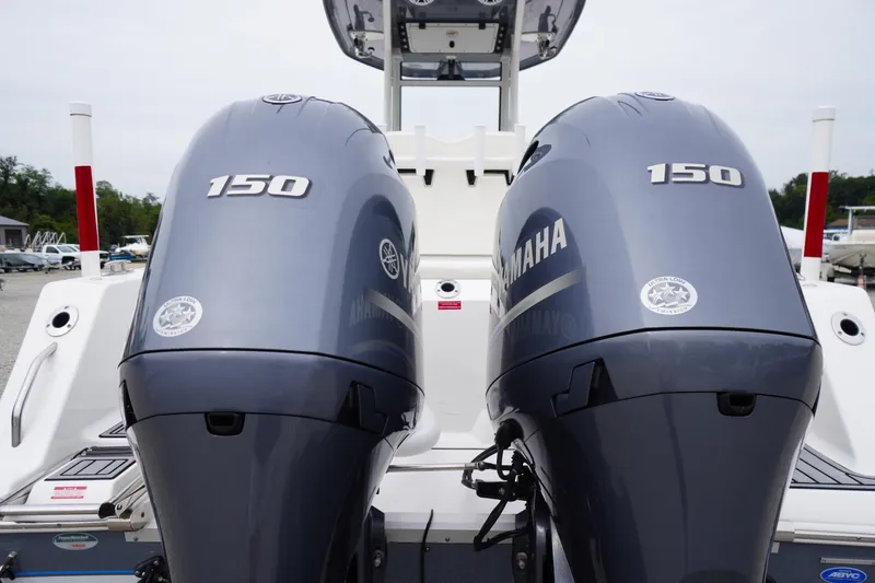 Slide: The Image of Twin Yamaha 150 engines on a 2021 Tidewater 256 CC Adventure boat. - 57