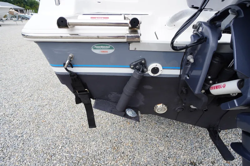 Slide: The Image of 2021 Tidewater 256 CC Adventure boat stern with Yamaha engine components. - 59