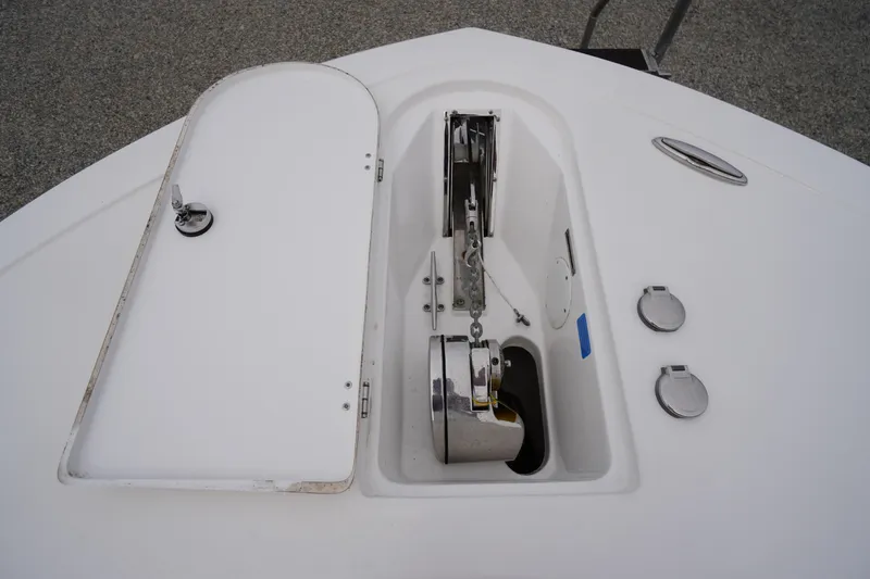 Slide: The Image of Anchor compartment of 2021 Tidewater 256 CC Adventure boat, featuring a sleek design. - 6