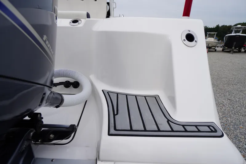 Slide: The Image of 2021 Tidewater 256 CC Adventure boat stern with motor and non-slip deck. - 62