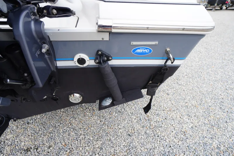 Slide: The Image of 2021 Tidewater 256 CC Adventure boat stern with ABYC certification label. - 63