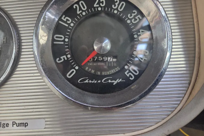 Slide: The Image of Vintage 1960 Chris Craft 19 Capri tachometer displaying RPM and engine hours. - 7