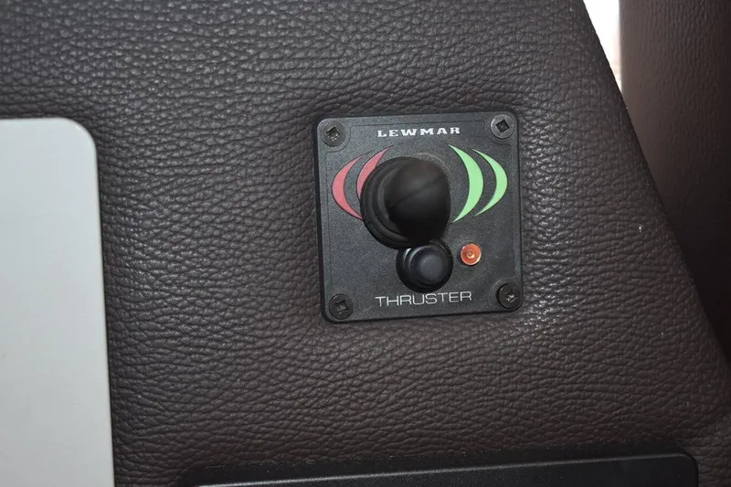 Slide: The Image of Lewmar thruster control on 2018 Ranger Tugs R-23 boat dashboard. - 24