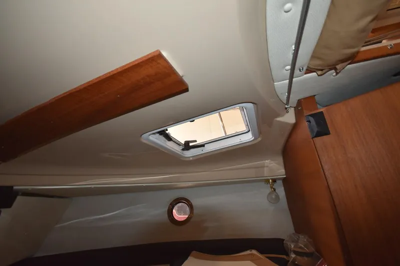 Slide: The Image of Interior view of 2018 Ranger Tugs R-23 boat cabin with ceiling hatch. - 36