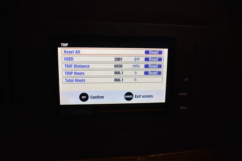 Slide: The Image of Yamaha display showing trip data: 2881 gallons used, 6930 miles, 866.1 hours on Ranger Tugs R-23. - 45