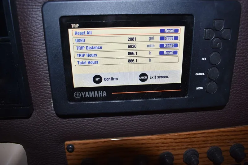 Slide: The Image of Yamaha display on 2018 Ranger Tugs R-23 showing trip data and reset options. - 48
